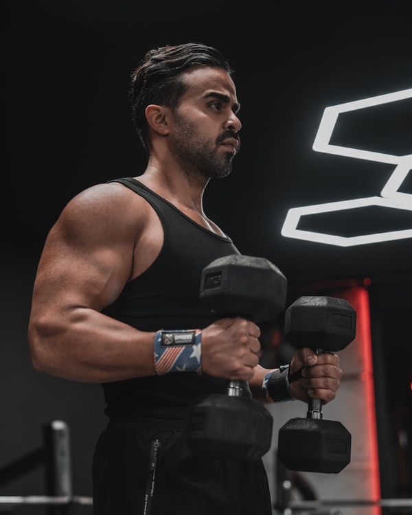 Man in a state of calm focus before a workout session.